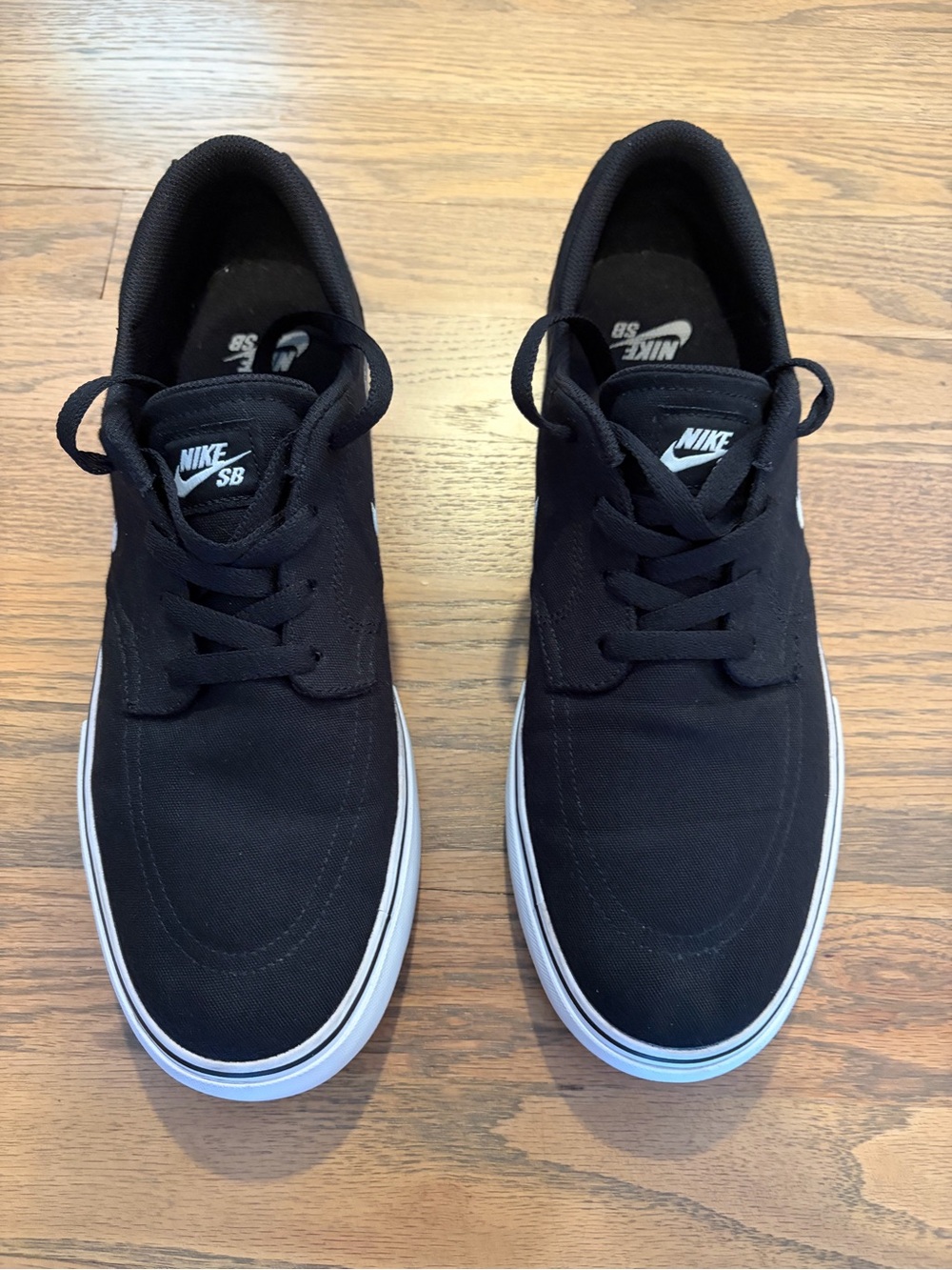 Nike Men’s SB Black Canvas Sneakers with White Sole